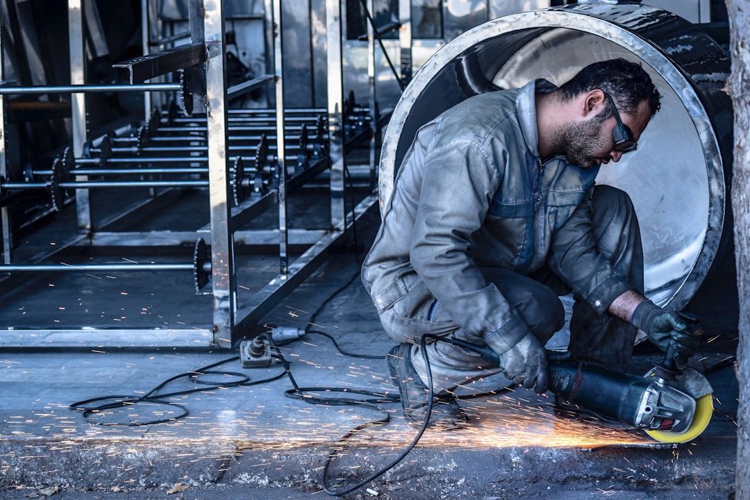 A technician at work on an industrial vessel